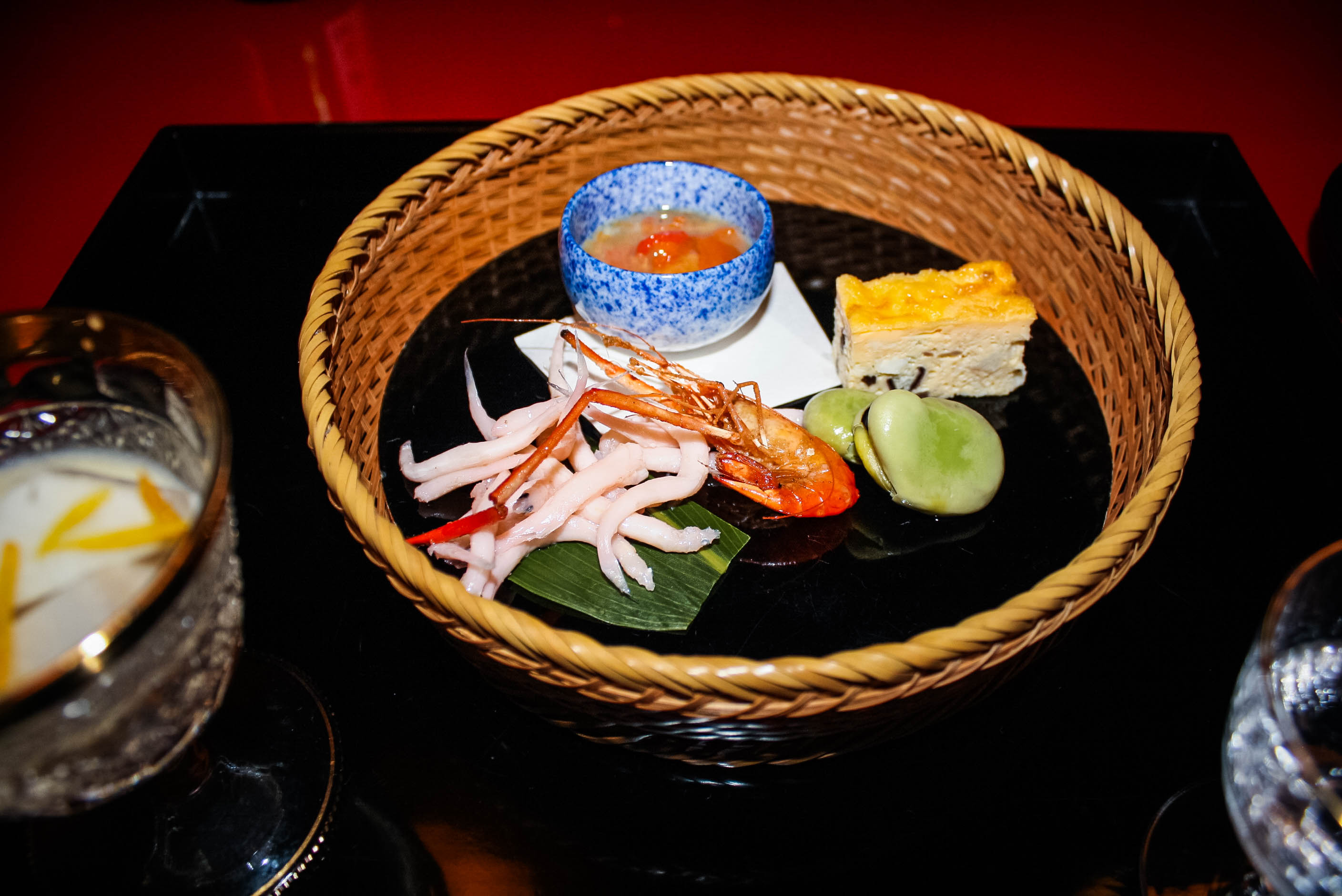 This was the first dish. I know for sure because those light pink things all had eyes and reminded me of worms. I think they were actually a type of shelled shrimp, but it was still a scary way to start the meal.