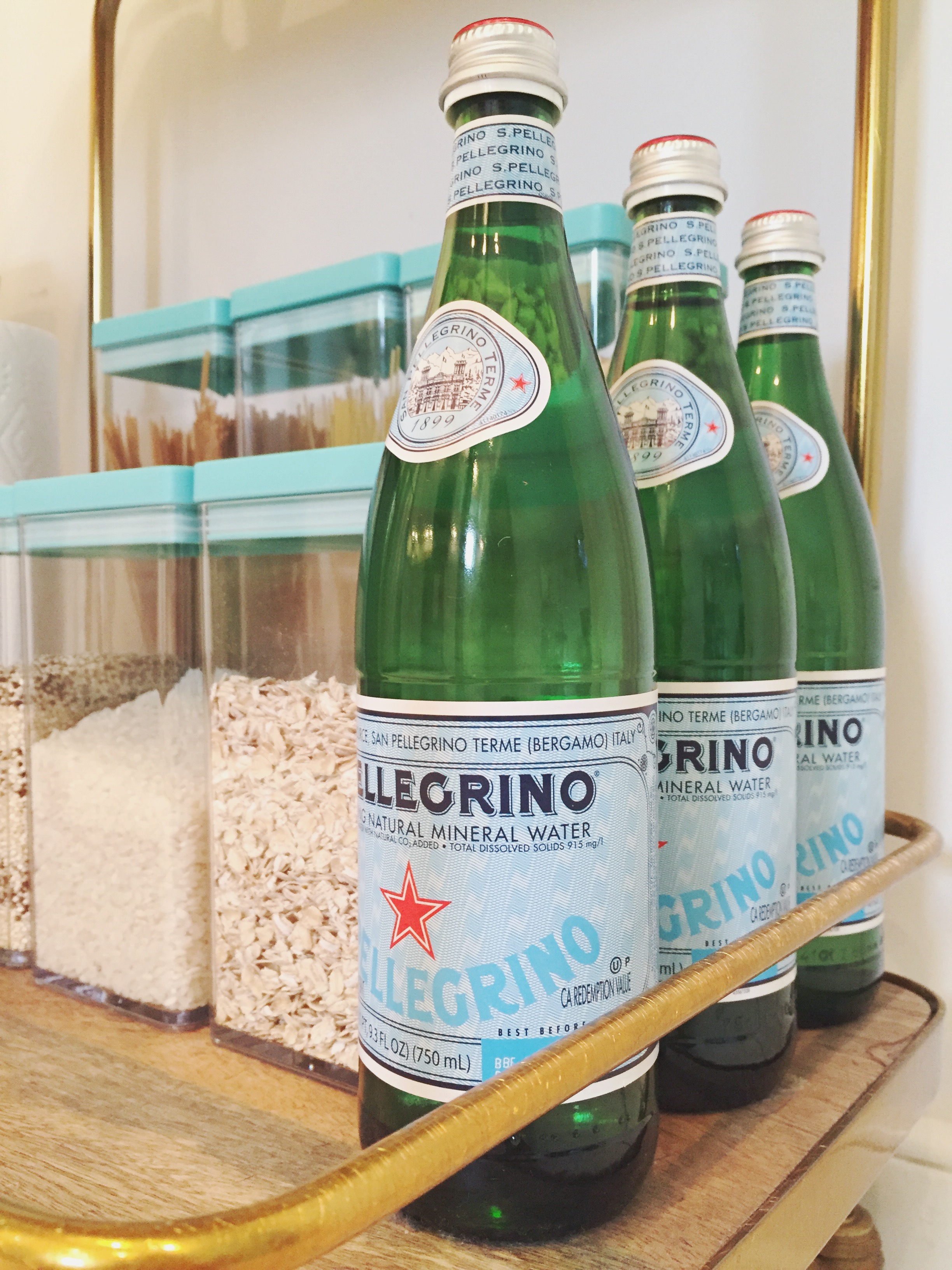 bar cart pantry in Tiny Kelsie's bright &amp; kitschy kitchen