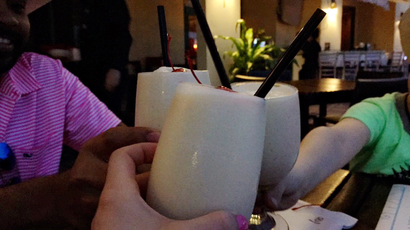 Pina colada cheers at Sheraton Old San Juan in Puerto Rico